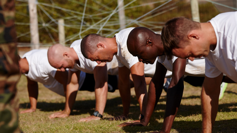 Military men doing pushups