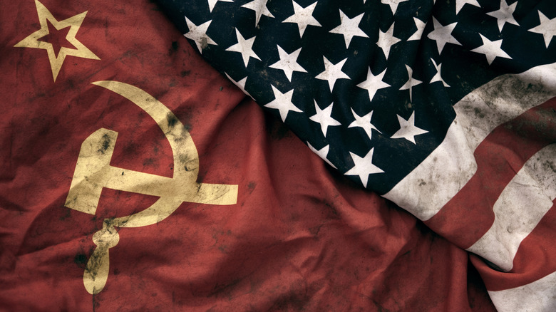 Closeup of U.S. and Soviet Union flags crumpled together.