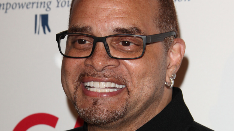 Sinbad smiling at a benefit