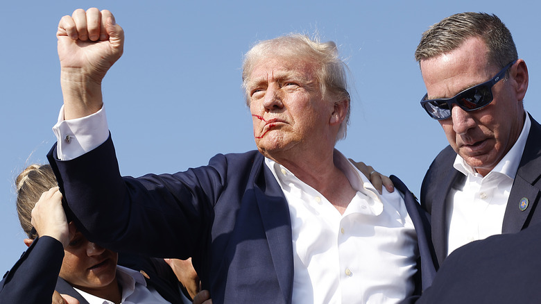 Donald Trump carried by secret service after shooting
