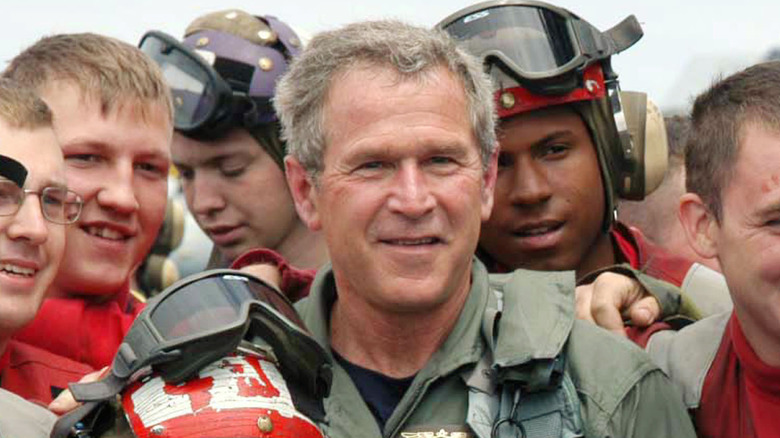George Bush on aircraft carrier in flight suit