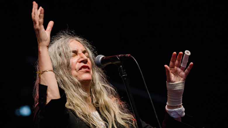 Patti Smith hands up