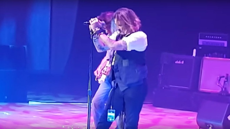 Johnny Deep singing at Jeff Beck concert