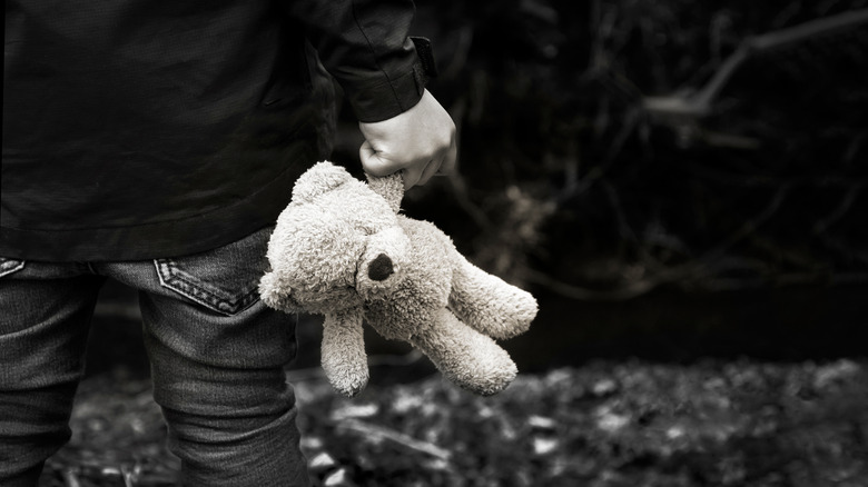 Little boy with teddy bear