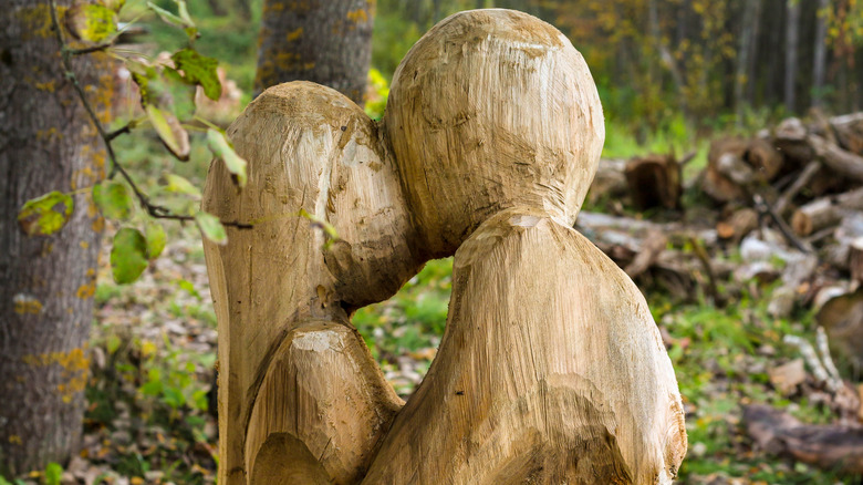 wooden carving of lovers