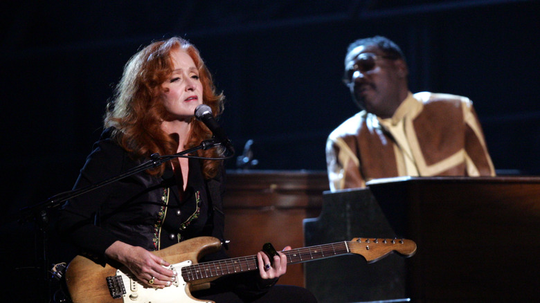 Bonnie Raitt singing with piano