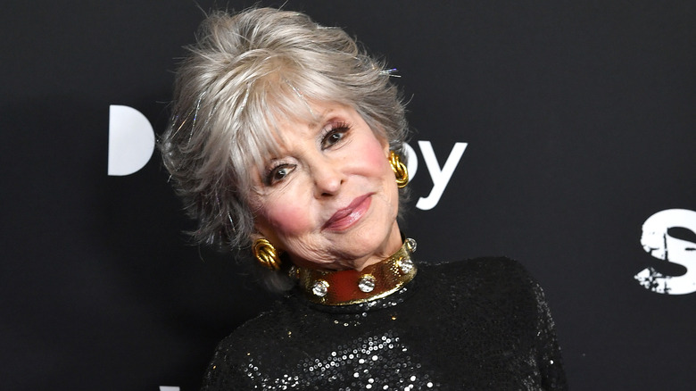 Rita Moreno in collar and sequin dress