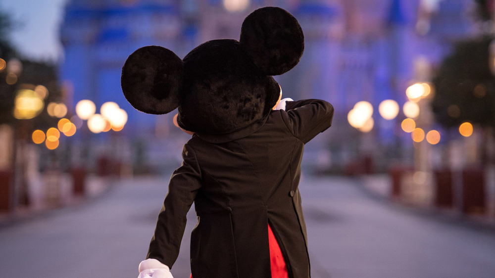 Mickey Mouse waltzes down a lane in Walt Disney World Resort in 2020