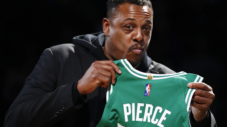 Paul Pierce holding Celtics jersey