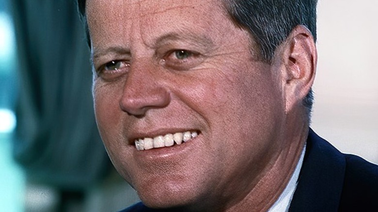 JFK smiles