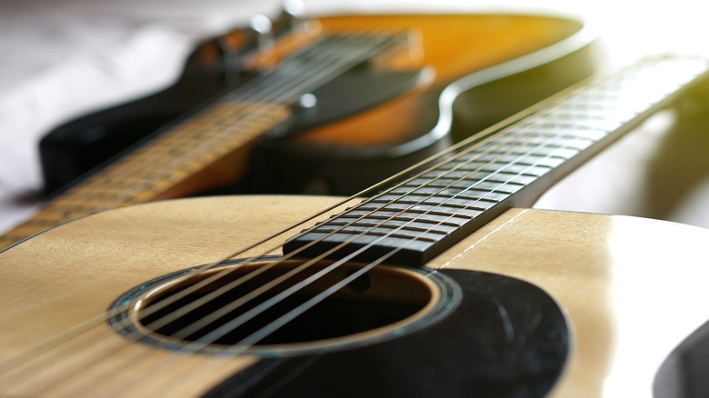 Acoustic and electric guitar closeups