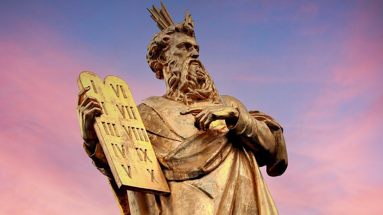 Moses holds Ten Commandments