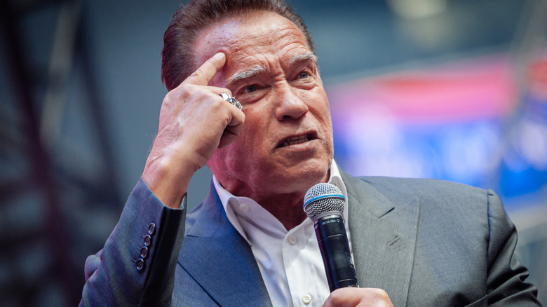 Arnold Schwarzenegger with microphone