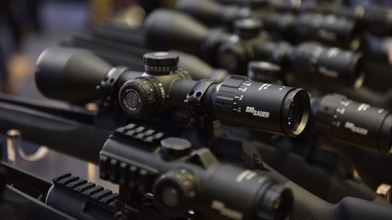 Firearms with telescopic sights