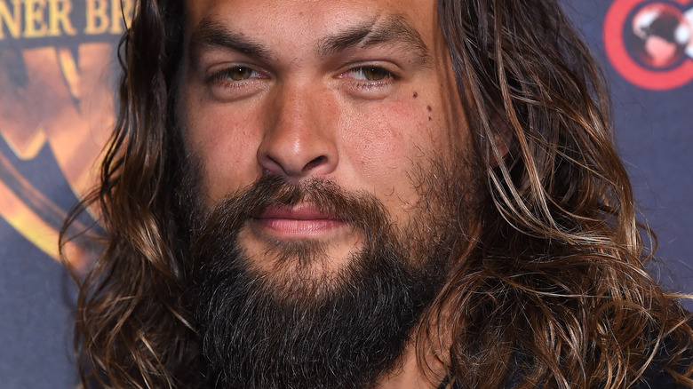 jason momoa on the red carpet for a premiere