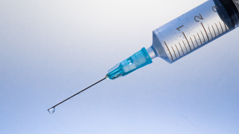 A syringe full of fluid