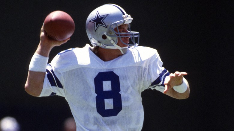 Troy Aikman looks to pass
