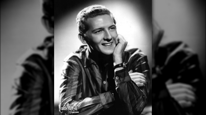 Jerry Lee Lewis hand cheek