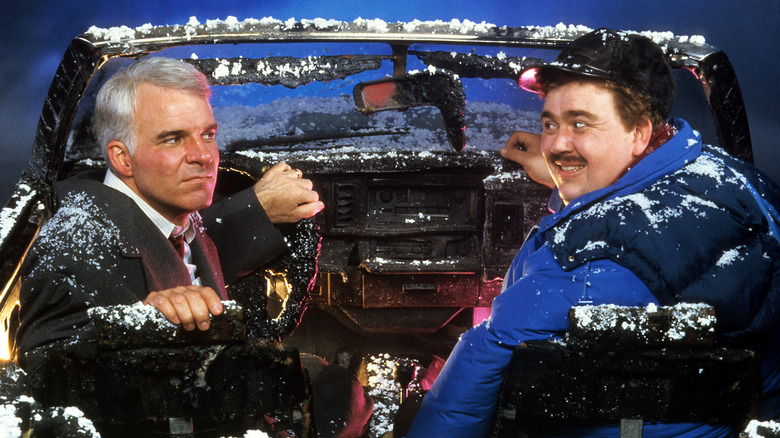 Steve Martin and John Candy in Planes, Trains, and Automobiles wrecked car