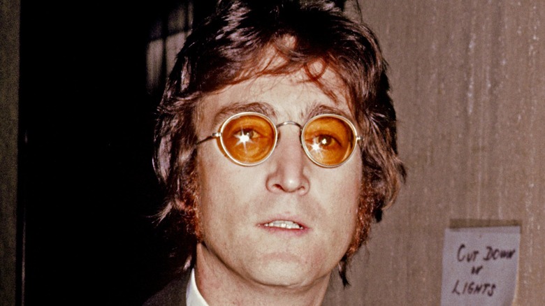 John Lennon in orange glasses