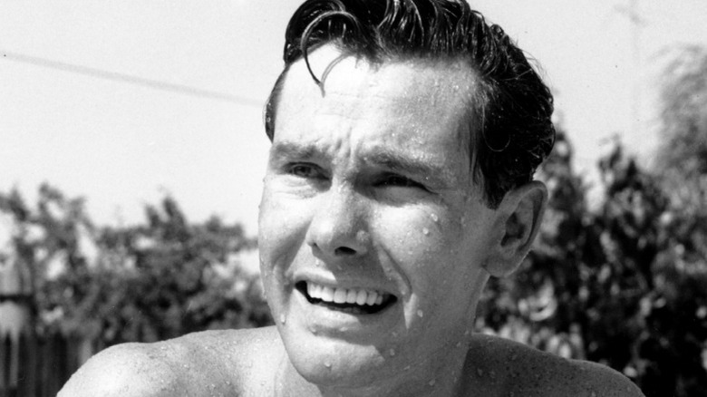 Johnny Carson in his pool 