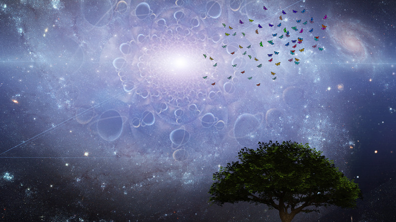 Tree against mystical space background