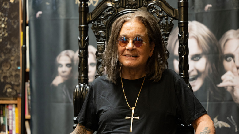 Ozzy Osbourne in a chair