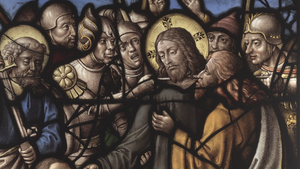 Stain glass of Judas kissing Jesus