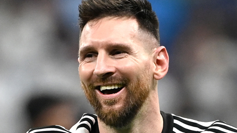 Lionel Messi smiling at world cup win