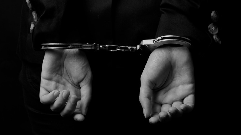 Female hands in handcuffs