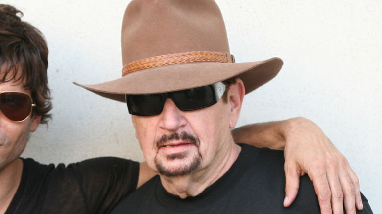 Dave Jerden in hat scowling