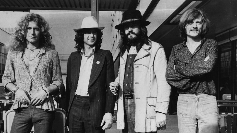 led zeppelin standing outdoors