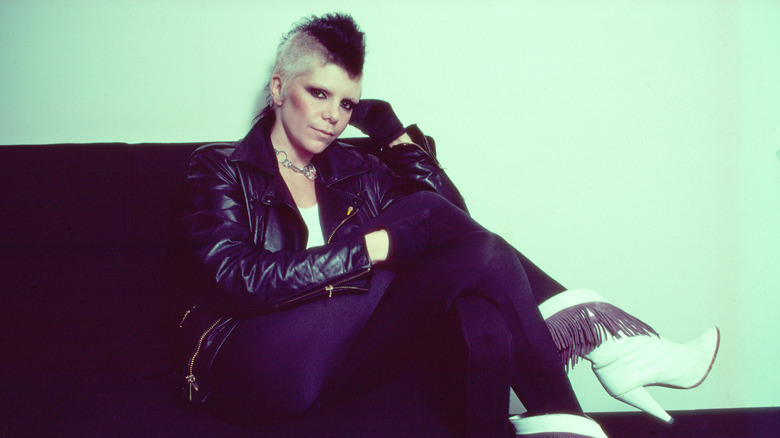 wendy o. williams seated on a sofa backstage