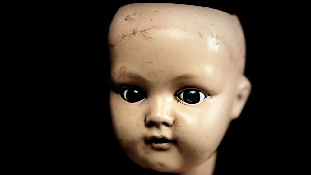 Creepy porcelain doll face