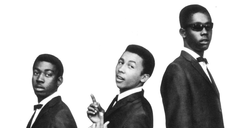 young Bob Marley with two others