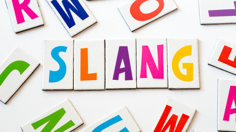"Slang" written in block letters