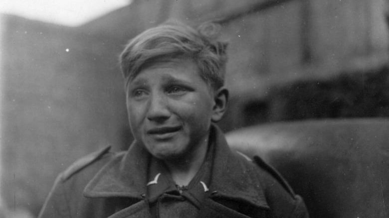 captured child soldier weeps, 1945, germany