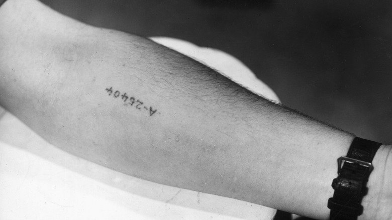 nazi tattoo on forearm of survivor