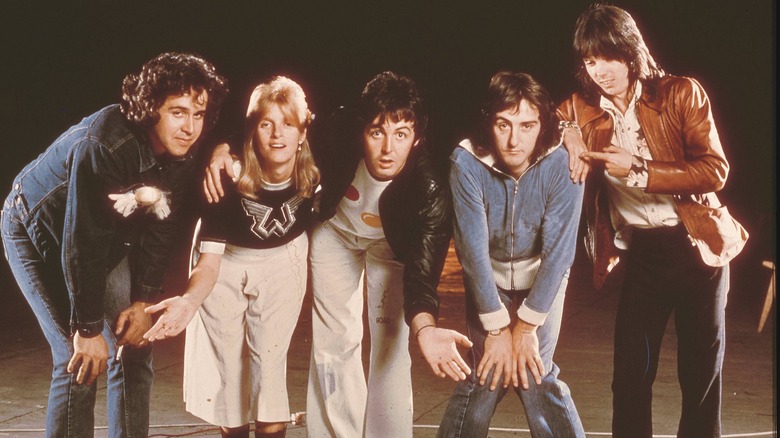Paul and Linda McCartney posing with Wings
