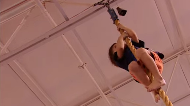 Liam Hoekstra climbing a rope