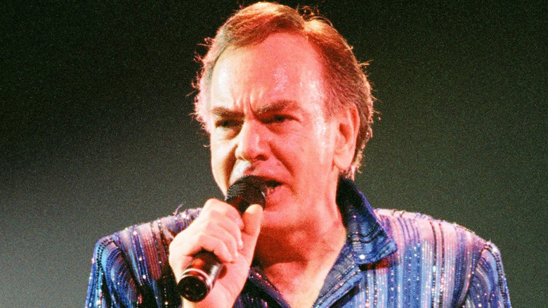 Neil Diamond singing onstage in the 1990s