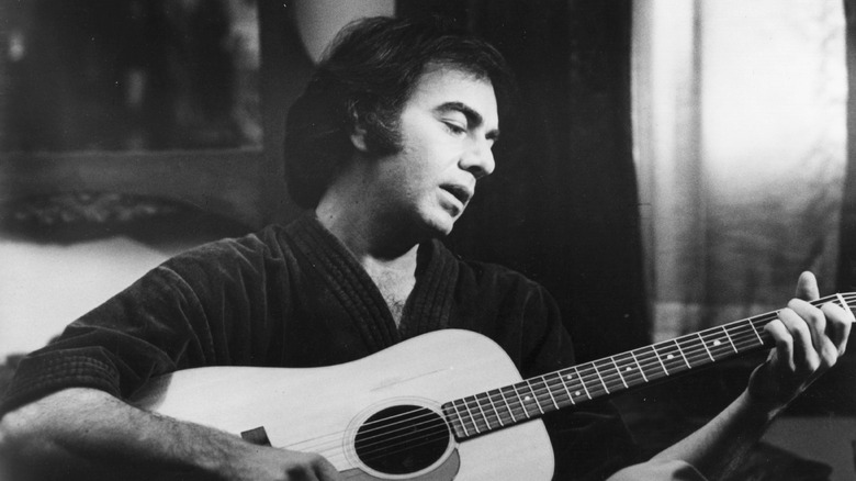Neil Diamond playing guitar in The Jazz Singer