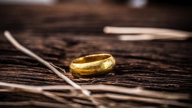 gold ring and twigs