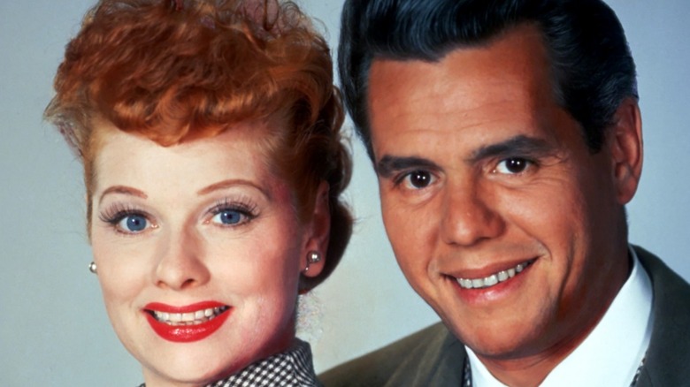 Lucille Ball and Desi Arnaz smiling