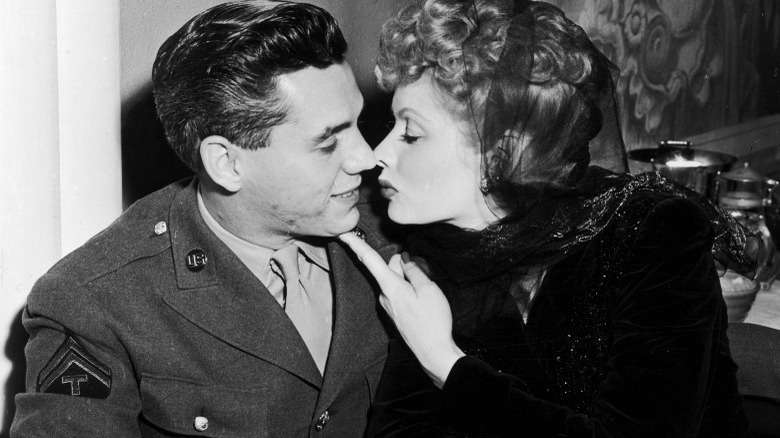 Arnaz in uniform kissing Ball