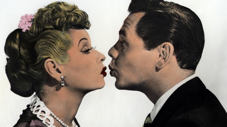 Ball and Arnaz kissing