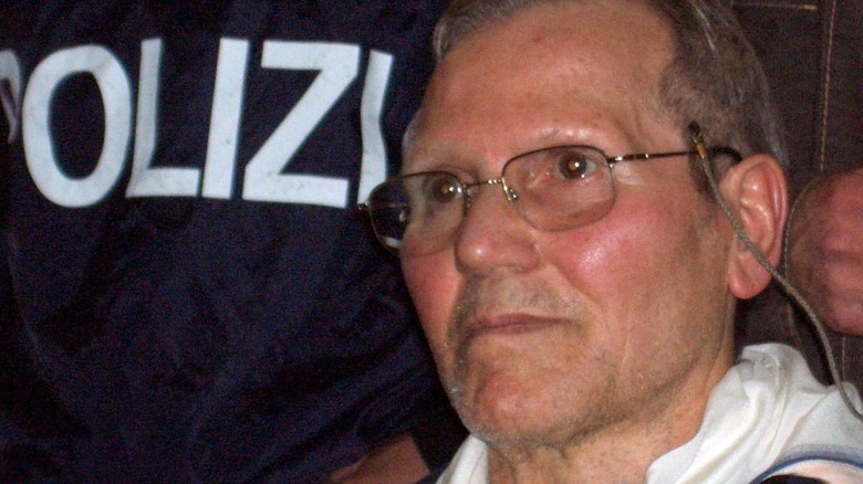 Provenzano looking up eyeglasses