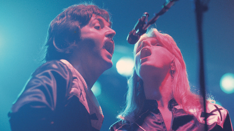 Paul and Linda McCartney onstage in the 1970s