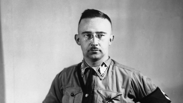 Nazi leader Heinrich Himmler posing for a photo in the 1930s