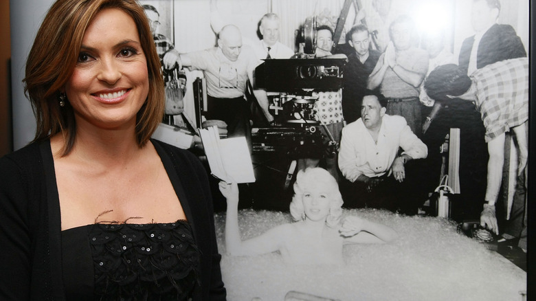 Mariska Hargitay in front of a photo of her mother